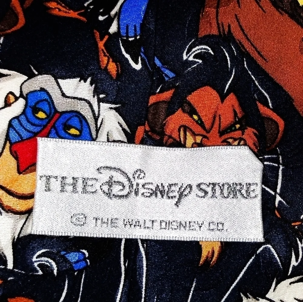 The Disney Store Lion King characters neck tie black background